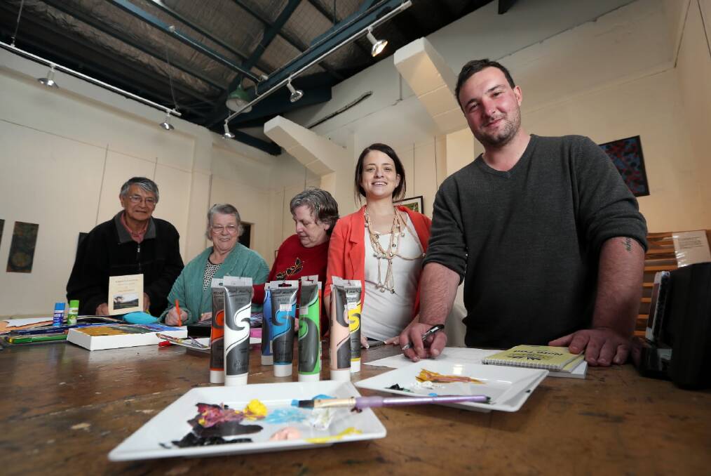 Maurie Foun, of Towong, Jenny Fogarty, of Mansfield, Lesley Howe, of Thurgoona, Rachael Puddephatt, of Hume Medicare Local, and Todd Ruffin, a peer support worker for people living with mental illness in Finley, working on their creations at Creators Art Space. Picture: MATTHEW SMITHWICK