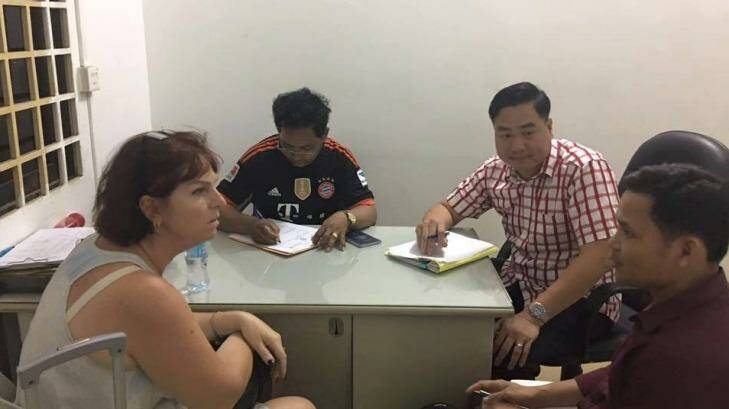 Tammy Davis-Charles being questioned. Photo: Cambodian National Police