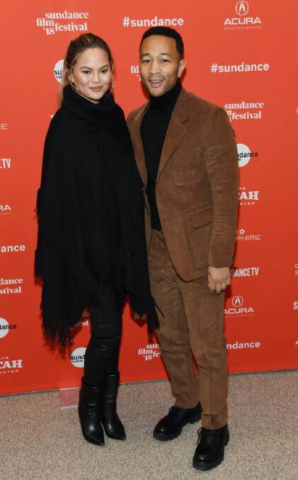 John Legend, right, executive producer of "Monster," poses with his wife Chrissy Teigen at the premiere of the film at the 2018 Sundance Film Festival on Monday, Jan. 22, 2018, in Park City, Utah. (Photo by Chris Pizzello/Invision/AP)
