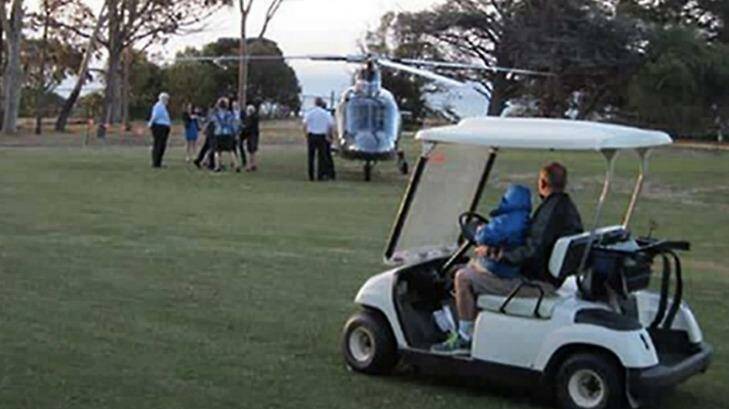 Bronwyn Bishop arrives by helicopter at a golf course for a Liberal fundraiser. Photo: Twitter @neilremeeus