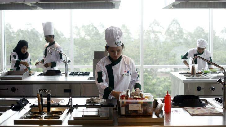 A students take a cooking class in Aipro Training Centre, at Tangerang, Banten Province. Photo: Irwin Fedriansyah