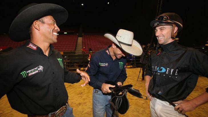 Bullish: Tye Angland with bull riding champions Cristiano Cunha, left, and Robson Guedes, who will compete in the national championships at the Entertainment Centre on Saturday night. Photo: Fiona Morris