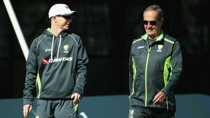 Recovery: Chris Rogers  and Australian team doctor Peter Brukner during  the tour match in Derbyshire. Photo: Getty Images 
