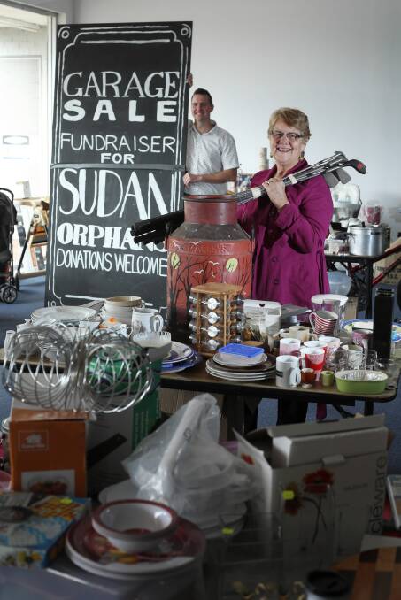Nathan Schubert and his mother, Pam Schubert, are running a garage sale to raise money for children in the Philippines and South Sudan.The garage sale will be held in Wodonga for the next three weeks. Picture: Matthew Smithwick