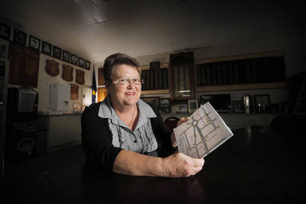 Wodonga RSL sub-branch secretary Jenny Bolt with a map of the proposed changes to the route of the Anzac Day march. The change is due to the ongoing works in High Street. Picture: TARA GOONAN