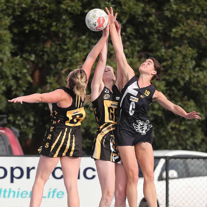 Yarrawonga’s Laura Bourke battles with Albury’s Justine Willis and Brigetta Hart. Picture: JOHN RUSSELL