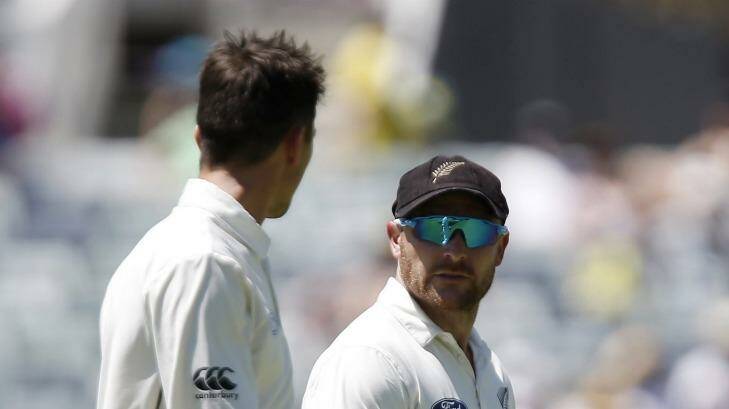 New Zealand captain Brendon McCullum, right, talks to teammate Trent Boult in Perth on Friday. Photo: Theron Kirkman