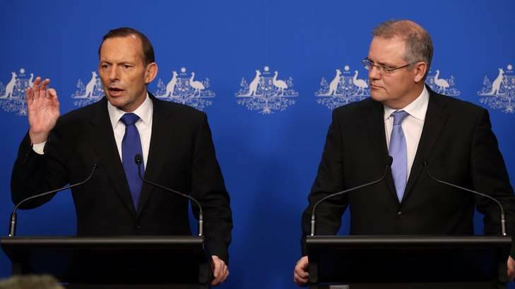 Asylum seekers paid off: Prime Minister Tony Abbott and Immigration minister Scott Morrison. Photo: Andrew Meares