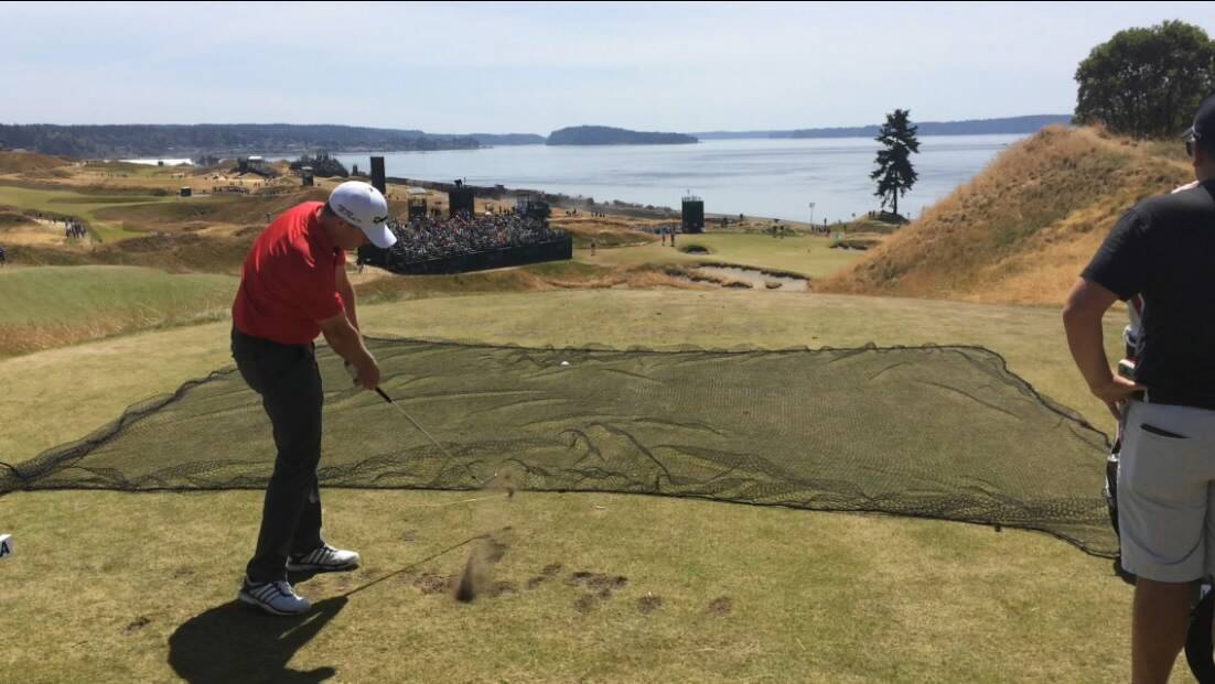 Marcus Fraser practices off the 15th tee at Chambers Bay, but overnight it was for real. Picture: GOLF AUSTRALIA