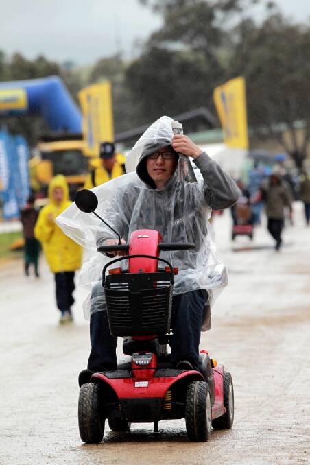 LEFT: The damp or distance were no problem for John Michael, of Melbourne, as he scooted around the field days. Picture: KYLIE ESLER