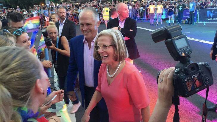 Prime Minister Malcolm Turnbull and his wife, Lucy, greet revellers on Oxford Street during this year's Mardi Gras parade. Photo: Supplied