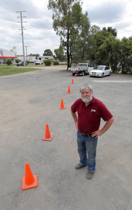 Peter Russell is concerned about parking issues for his Kendall St business. Shown here standing in the area where he can legally park out the front of his business. Picture: DAVID THORPE