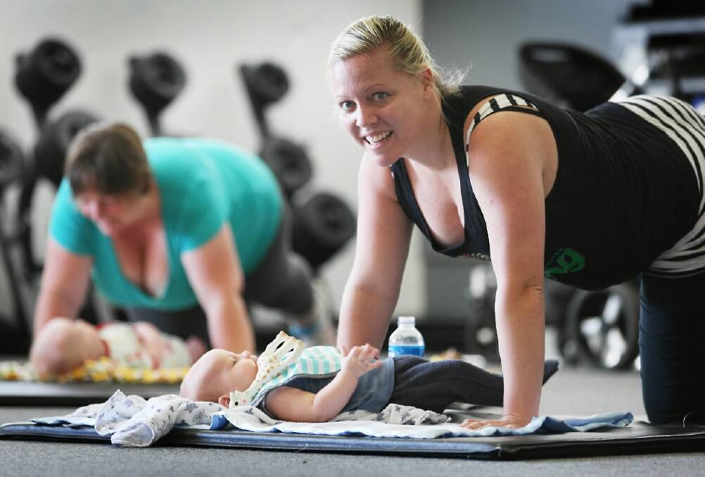 Jacqui Turner works on her fitness with the help of her son Austin McGaffin at Wodonga’s Fitness 24/7. Picture: DYLAN ROBINSON