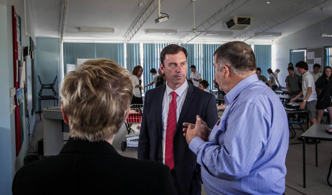 Labor’s Colin Brooks chats with Rutherglen High principal Philip Rogers and Labor’s Benambra candidate Jennifer Podesta. Picture: DYLAN ROBINSON