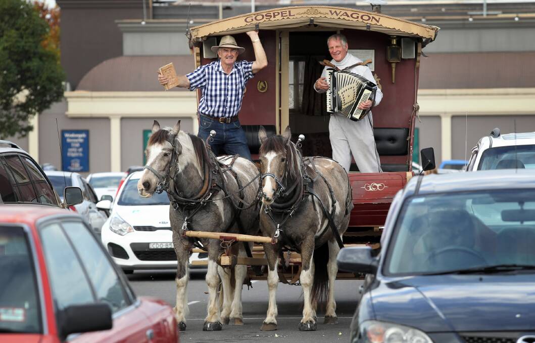 Colin Trevaskis and Yackandandah’s Ian Maddock on the gospel wagon in Wodonga. Picture: KYLIE ESLER