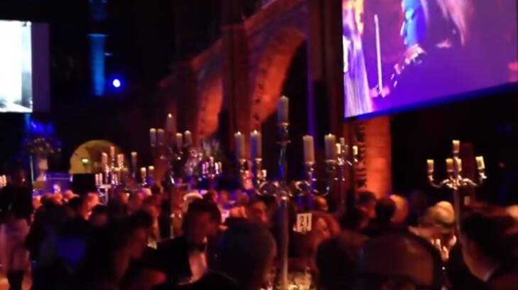 The scene from inside the London gala dinner. Photo: YouTube