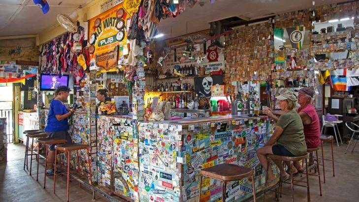  Daly Waters Pub,  decorated with business cards, banknotes and memorabilia, sits  along the Stuart Highway, Northern Territory, Australia. Photo: Jessica Dale