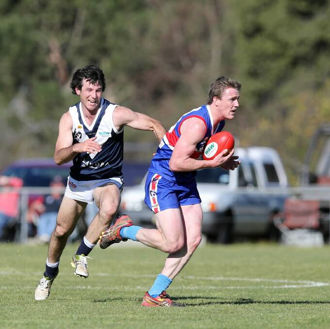 Thurgoona’s Kade Brown takes a chest mark in front of Mitta United’s Tyson Gorupic in the qualifying final a fortnight ago.