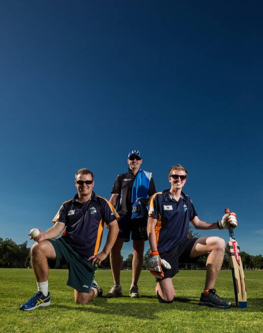 Albury junior cricket’s Wayne Good (centre) with blind cricketers Mathew Kent, 25, and recently selected Aussie player Mike Hamilton, 23, at training at Billson Park this week. Picture: DYLAN ROBINSON