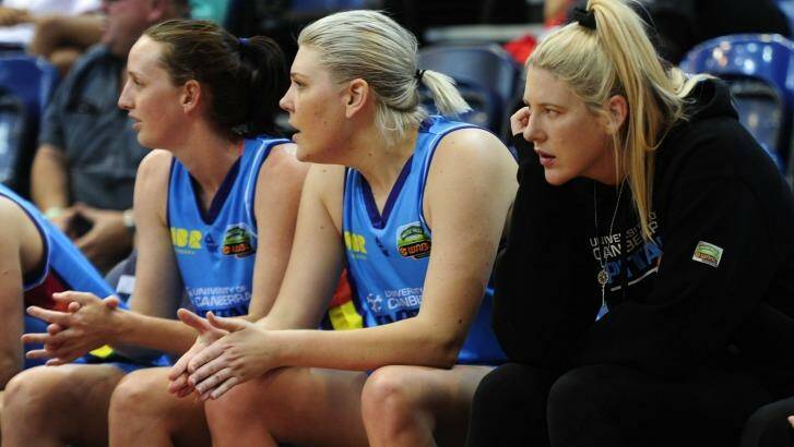 Right, Canberra Capitals player Lauren Jackson looks on from the bench.  Photo: Melissa Adams 