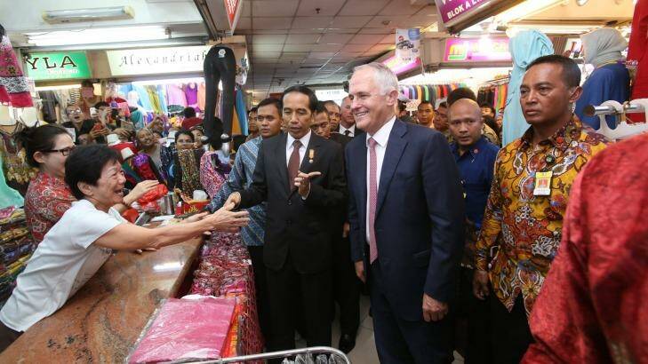 Prime Minister Malcolm Turnbull with Indonesian President Joko Widodo taking  a stroll through a textile market in Jakarta in November of last year.