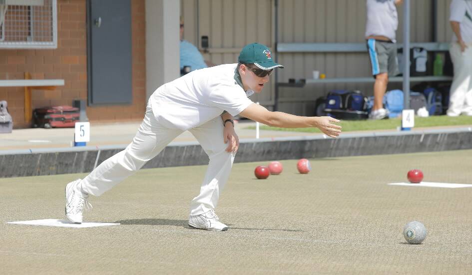 Chris Langdon sends down a bowl for the Ovens and Murray in its convincing win.