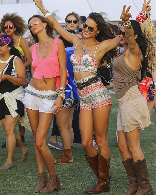 Alessandra Ambrosio dances with friends at Coachella. Photo: dailymail.co.uk