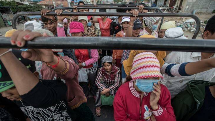 Around 700,000 Cambodians, mostly women, work in  garment factories. Thousands of the workers cram together on trucks from the provinces to  work in factories on the outskirts of Phnom Penh. Photo: Jason South