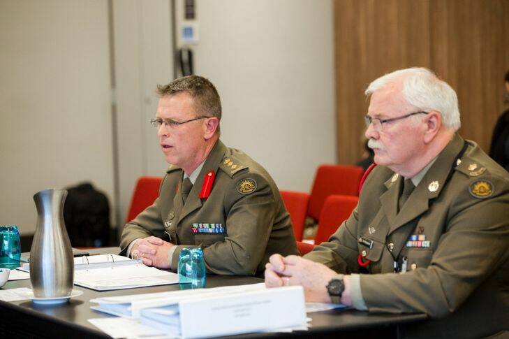 Defence Honours and Awards Appeals Tribunal hearing.
from left, Department of Defence witnesses, Colonel Griffith Thomas and Major Phil Rutherford.
Photo: Jamila Toderas