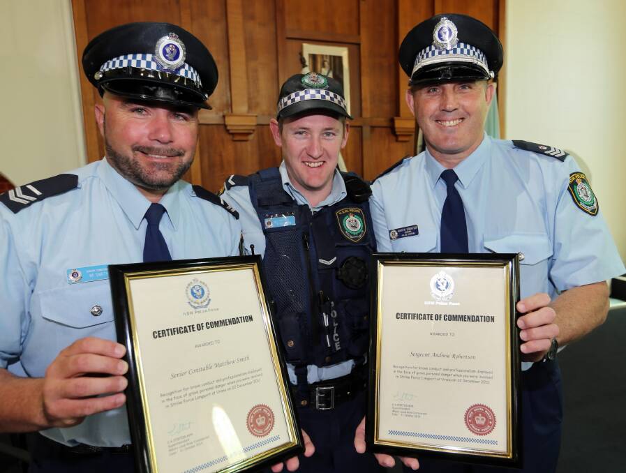 Sen-Constable Matthew Smith, Constable Justin Dickson and Sen-Sgt Andrew Robertson received certificates ofcommendation at yesterday’s ceremony. Picture: PETER MERKESTEYN