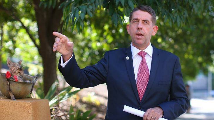 Health Minister Cameron Dick has told an AMA conference that Federal funding changes will cost Queensland 8000 doctors and nurses. Photo: Chris Hyde