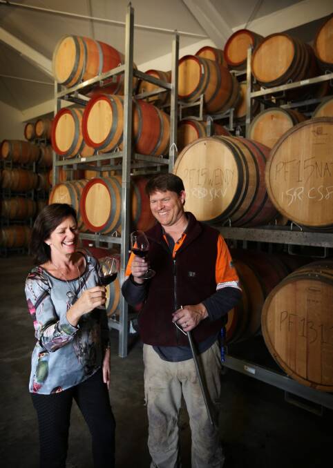 Wendy Killeen and winemaker Andrew Drumm, from Stanton and Killeen Wines, where wine barrells are being prepared for this year’s grape harvest. Pictures: MATTHEW SMITHWICK