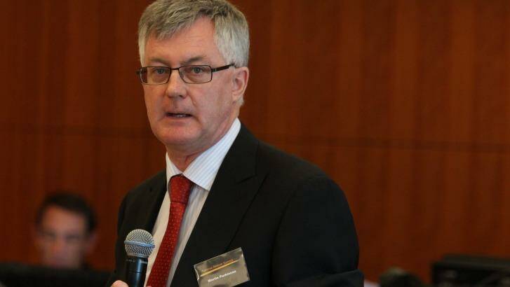 Former Treasury head Martin Parkinson warned that Australia could sacrifice as much as 5 per cent of the economy in missed economic growth. Photo: Louie Douvis
