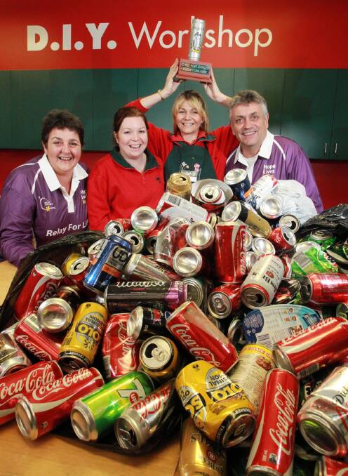 Sharyn Waldron, Rachel Curtis, Jade Whittaker and John Waldron with some of the cans collected for the campaign. Picture: KYLIE ESLER