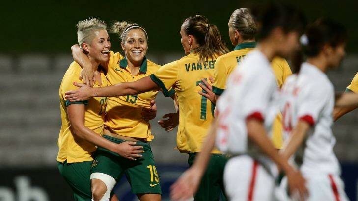 Michelle Heyman celebrates with Australian teammates. Photo: Matt King/Getty Images