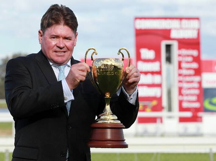 Brent Thomson with one of racing’s great cups.