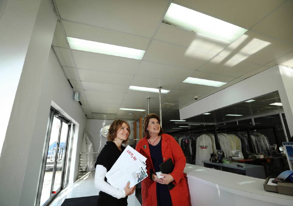 Origin’s Anne Armansin, right, gave Gouge Dry Cleaners owner Emma Thompson advice on how to save thousands of dollars. Picture: MATTHEW SMITHWICK