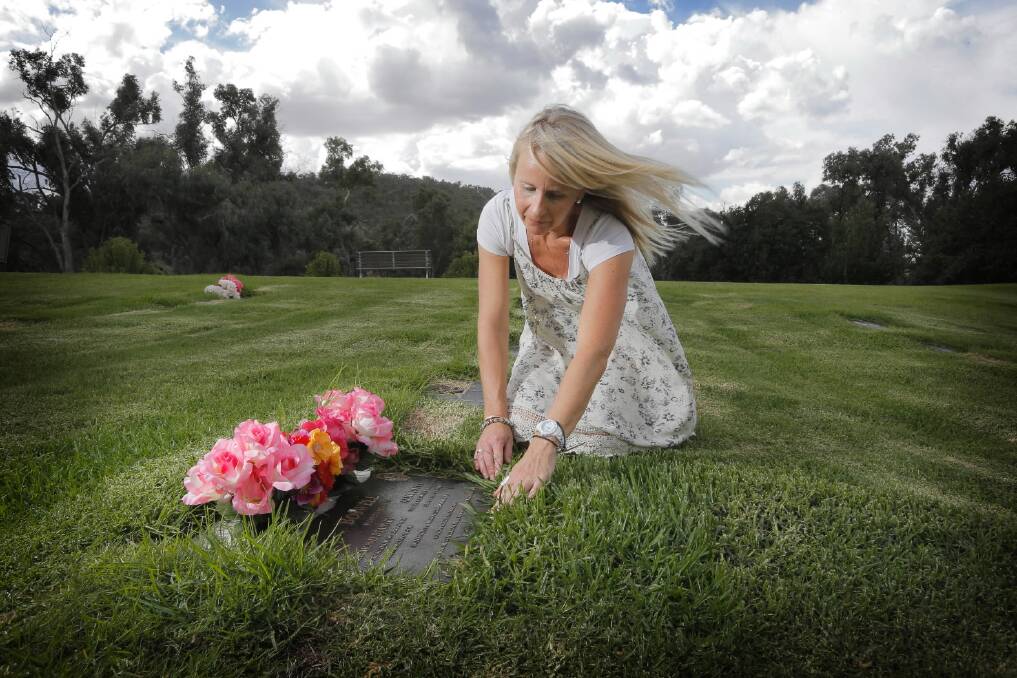 Fiona Oliver has fought for years for the council to improve the area where six of her relatives are buried at Glenmorus Gardens. Picture: TARA GOONAN