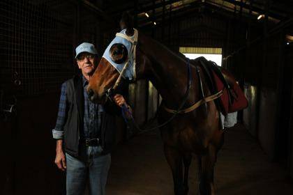 "He's my best mate" ... trainer Mick Burles with The Cleaner. Photo: Mark Jesser