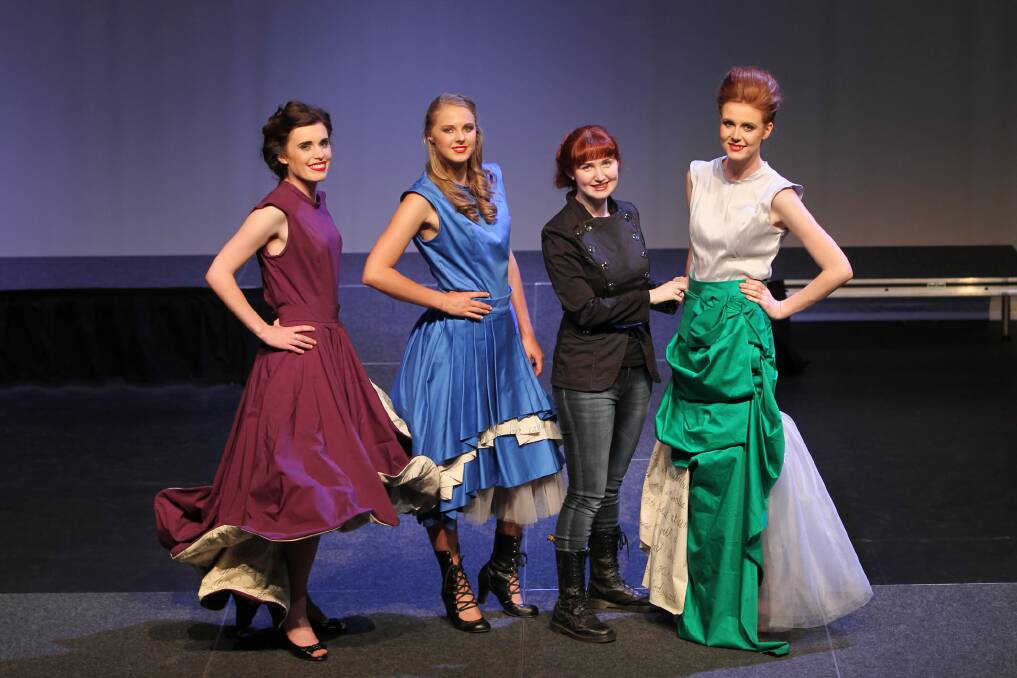 Models Haley Rickard, Caitlin McDonald, fashion student Lacey Smith and model Grace Kernaghan put the finishing touches to their outfits in preparation for Wodonga TAFE’s creative industries exhibition at The Cube Wodonga. Picture: MATTHEW SMITHWICK