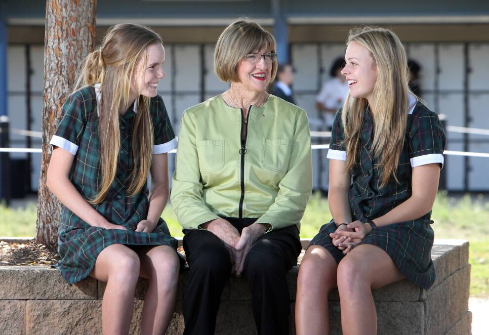 Xavier High students Emma Aldrich and Maddison Wighton chat with Margaret Court. Picture: KYLIE ESLER