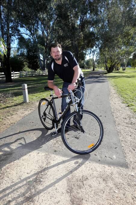 Cr Ross Jackson wants residents to leave the car at home and jump on their bike. Picture: PETER MERKESTEYN