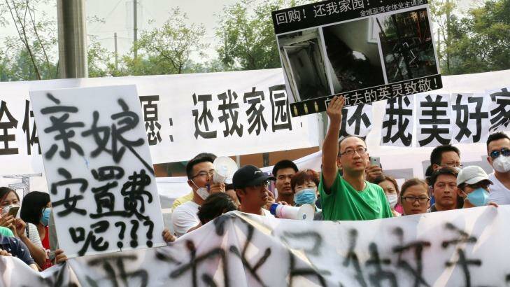 A protest in front of Tianjin TEDA Convention Centre Hotel on Wednesday. Photo: Sanghee Liu