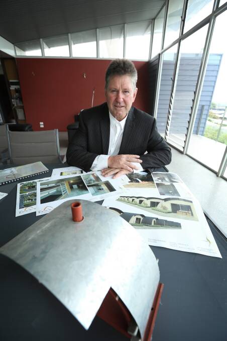 Albury architect Paul Simpson, above, looks over plans for his “EnviroDome” modules, which are being considered by the Victorian government for use as prison cells; below left: the plan of a two-person module and, right, more modules can be easily added. Main picture: MATTHEW SMITHWICK