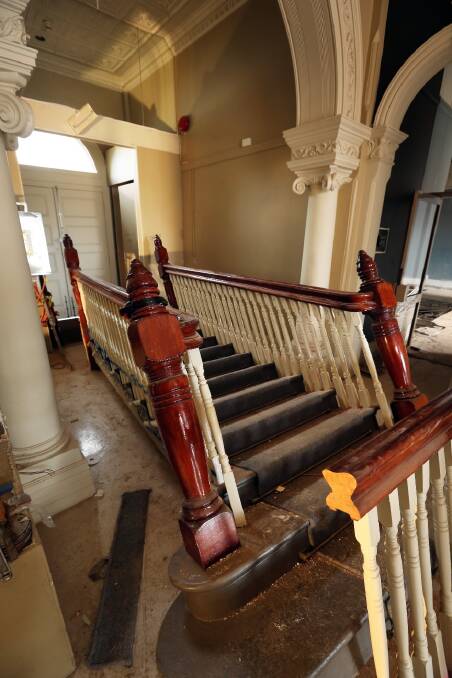 The grand century-old staircase is waiting to be shifted to Adamshurst. Picture: MATTHEW SMITHWICK