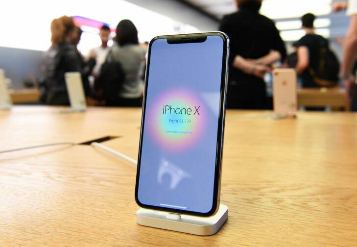 An iPhone X sits on a table following its global launch inside the Apple Store in Sydney, Friday, November 3, 2017. (AAP Image/David Moir) NO ARCHIVING
