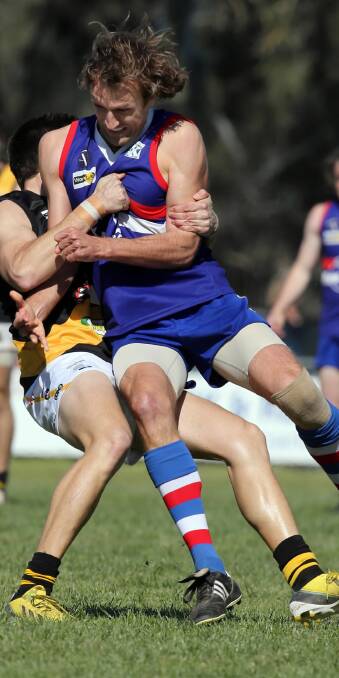 Tarrawingee defender Trevor Edwards can see improvement in the Bulldogs, but knows they must back it up against Glenrowan on Saturday if they are to be considered a genuine premiership chance.