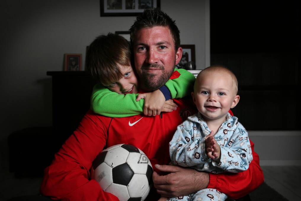 Josh Fluss will be able to spend more time with his sons Aiden, 5, and Christian, 17 months, after he retires on Saturday. Picture: MATTHEW SMITHWICK