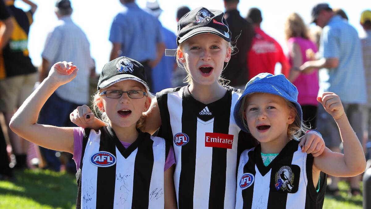 Young Collingwood supporters Hannah Snowdon, 9, Millie Carson, 9, and Ruby Snowdon, 6, of Wangaratta, had a great time despite the Pies going down to Richmond.