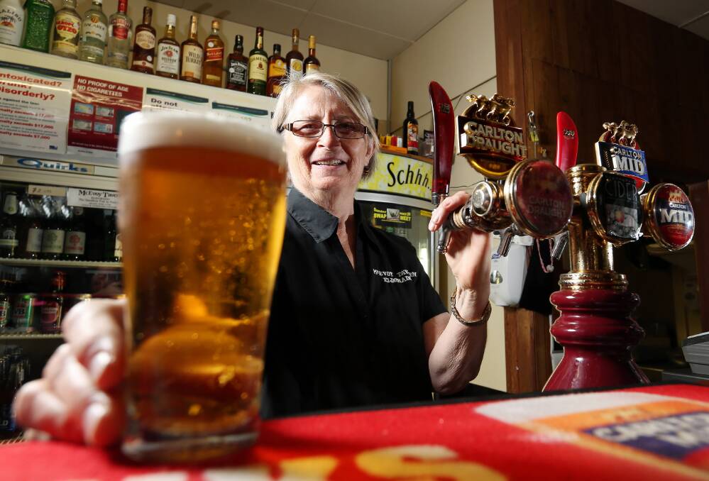 The perfect beer ... Christine Hanley shows the prowess that recently won her a $7000 prize. Picture: JOHN RUSSELL
